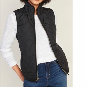 Quilted black vest with gold details and pockets